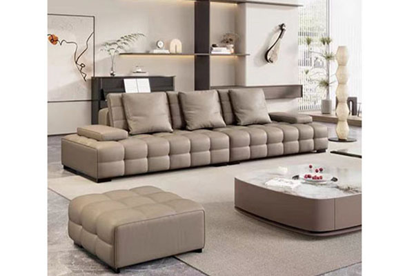 How does the color matching of Fabric Biscuit Cream Style Sofa create a warm and comfortable home atmosphere?